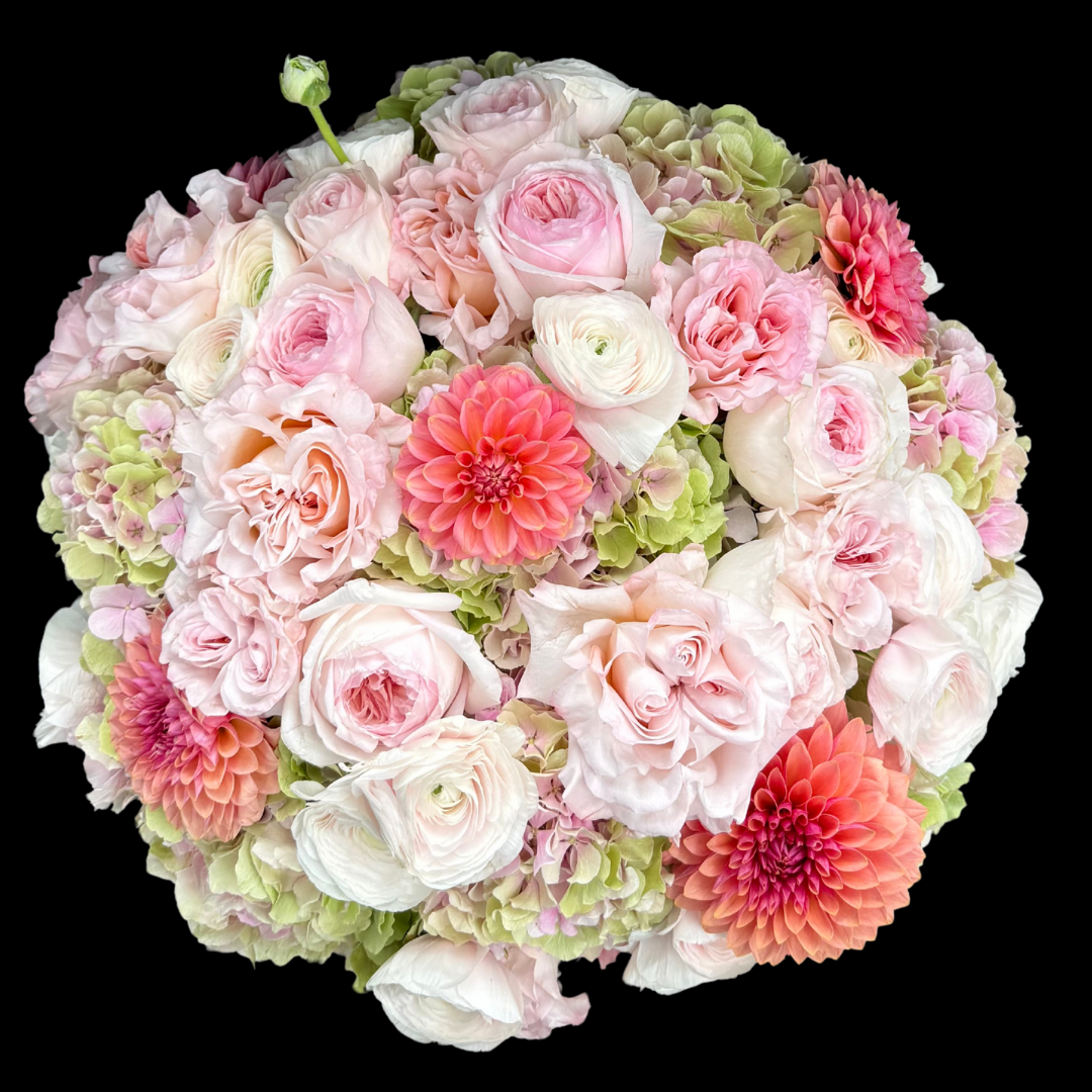 Luxury bouquet featuring unique garden roses, blush ranunculus, and pink and green hydrangeas. Handcrafted by Portland Market, a Toronto flower shop in the King West Entertainment District.