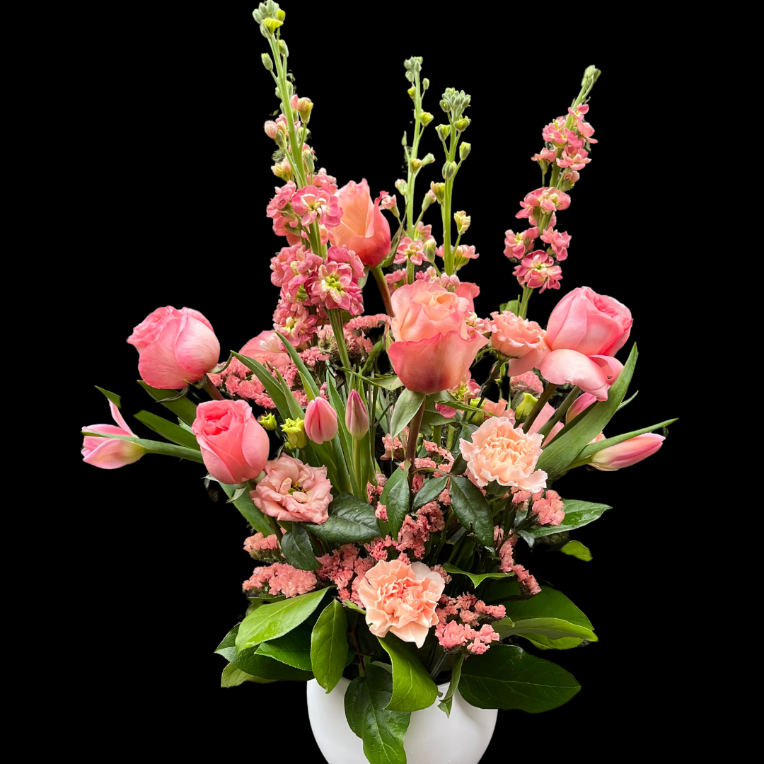 Luxury pink roses with tulips and carnations – an elegant arrangement / centerpiece of fresh flowers, perfect for Valentine's Day, Anniversaries, Birthdays, Mother's Day as well as any romantic occasion. Ideal for those seeking Downtown Toronto Florist-Portland Market- King West District is a luxury flower shop with Bespoke bouquets and arrangements, classic centerpieces or premium arrangements are timeless floral gifts.