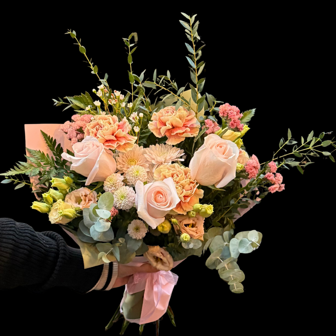 Luxury bouquet featuring unique garden roses, blush carnations and garden fuller flowers. Handcrafted by Portland Market, a Toronto flower shop in the King West Entertainment District. The perfect gift for Valentine's Day, Anniversaries, Birthdays, Mother's Day, as well as any romantic occasion. Ideal for those seeking downtown, Toronto Florist - Portland Market- King West District is a luxury flower shop with bespoke bouquet.