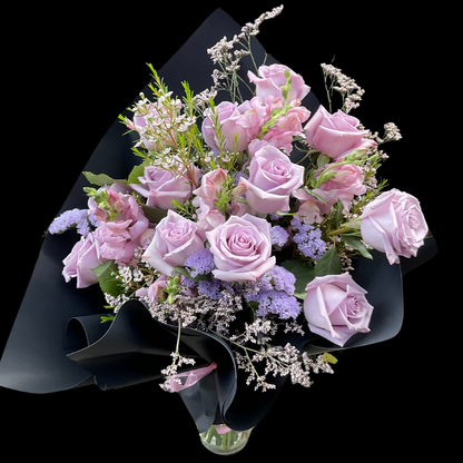 Fresh-cut lavender roses symbolize love at first sight - perfect Valentine's Day or Mother's Day bouquet for your special one. Portland Market, Toronto’s top florist and flower shop, where every gift keeps on giving.