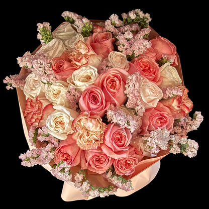 Luxury bouquet featuring unique blush, pink and county garden roses - filled with status flowers. Handcrafted by Portland Market, a Toronto flower shop in the King West Entertainment District.