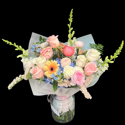 Luxury assortment of roses - Luxury bouquet with seasonal fillers. Hand-tied flower arrangement wrapped in special floral paper with ribbon. Perfect for Mother’s Day, birthdays, anniversaries, weddings, romantic gifts, and special occasions. Fresh premium roses from Toronto florist. 