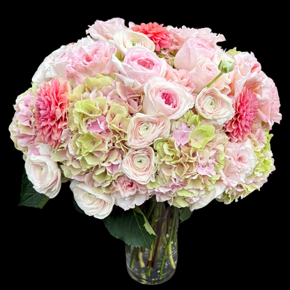 Luxury bouquet featuring unique garden roses, blush ranunculus, and pink and green hydrangeas. Handcrafted by Portland Market, a Toronto flower shop in the King West Entertainment District.