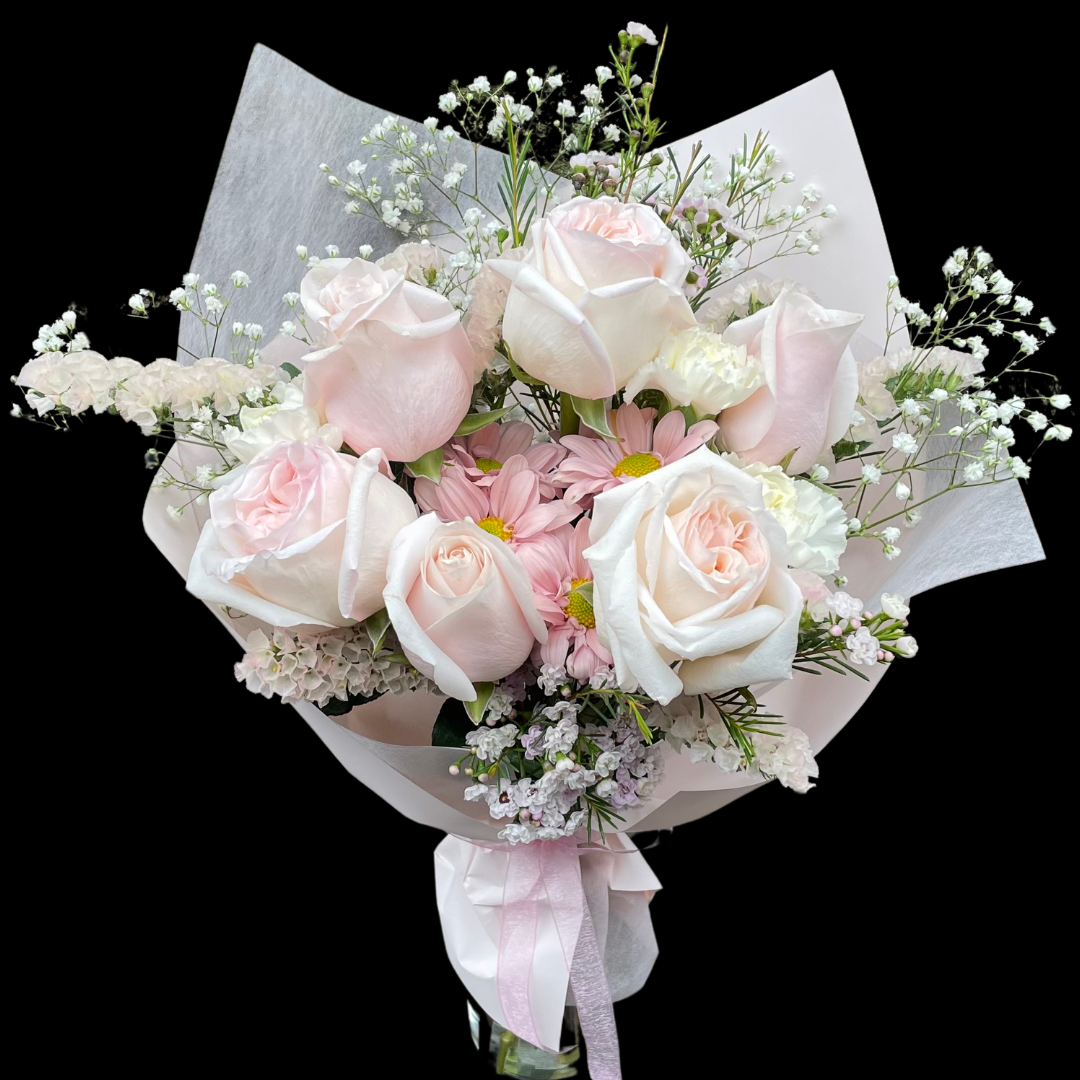 Luxury assortment of roses - Luxury bouquet with seasonal fillers. Hand-tied flower arrangement wrapped in special floral paper with ribbon. Perfect for Mother’s Day, birthdays, anniversaries, weddings, romantic gifts, and special occasions. Fresh premium roses from Toronto florist. 