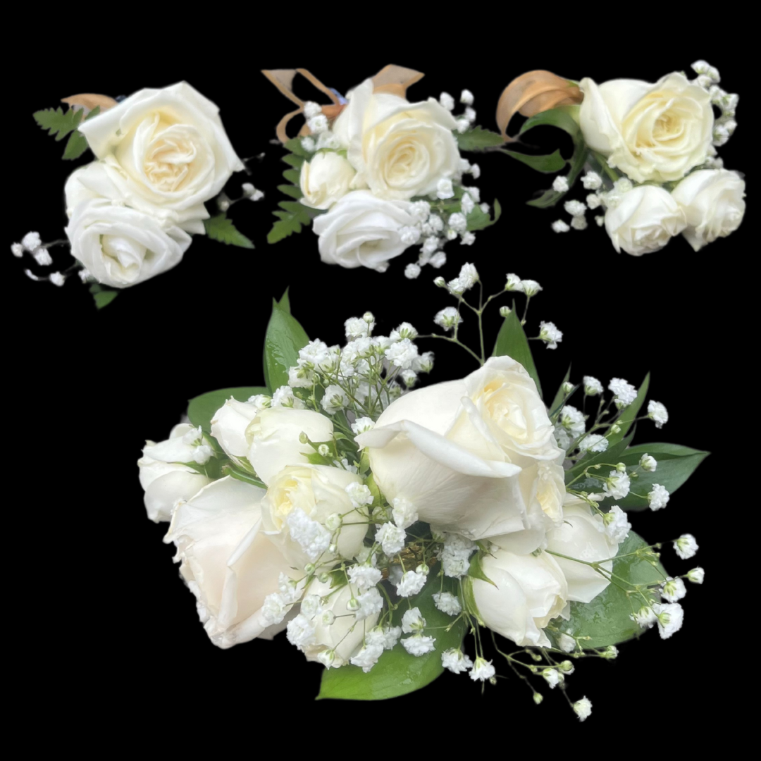 White Flower Boutonniere
An elegant accent for weddings, anniversaries, or formal events. Crafted with seasonal blooms and fresh greenery, finished with ribbon. Clean, refined, and timeless.

White Flower Wrist Corsage
A graceful touch for anniversaries, weddings,&nbsp;proms or special celebrations. Designed with fresh seasonal blooms and delicate foliage on an wrist band. Refined, elegant, and timeless wrist corsage.