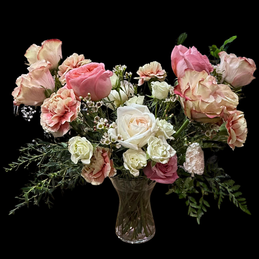 Luxury pink roses with spray roses and carnations – an elegant arrangement / centerpiece of fresh flowers, perfect for Valentine's Day, Anniversaries, Birthdays, Mother's Day as well as any romantic occasion. Ideal for those seeking Downtown Toronto Florist-Portland Market- King West  District is a luxury flower shop with Bespoke bouquets and arrangements, classic centerpieces or premium arrangements are timeless floral gifts.