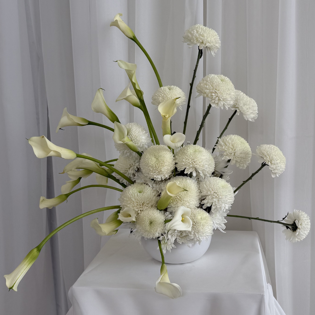 Calla lilies and chrysanthemum for a beautiful modern arrangement